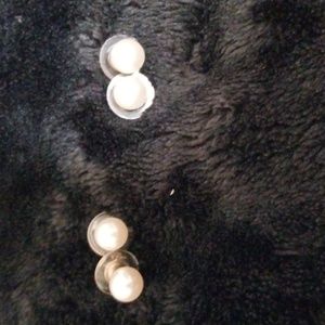 2 sets of pearl earrings. One is white, one slight pink. Silver post. Pierced